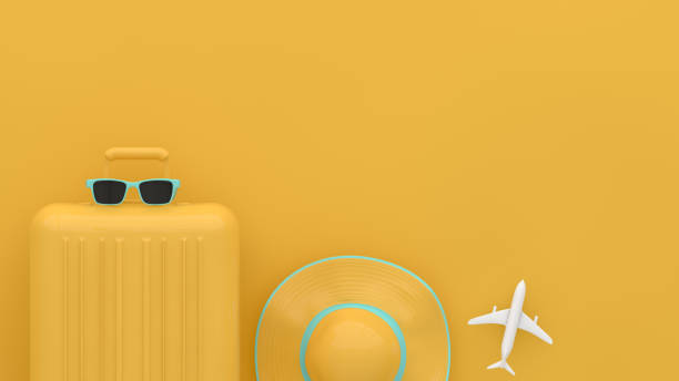 istock Suitcase, Minimal Travel Concept on yellow background 1209409074