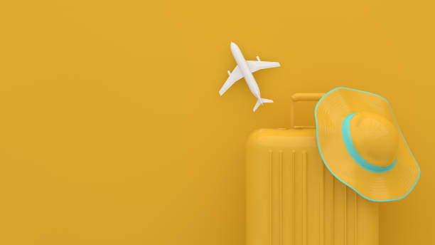 istock Suitcase, Minimal Travel Concept on yellow background 1209409276