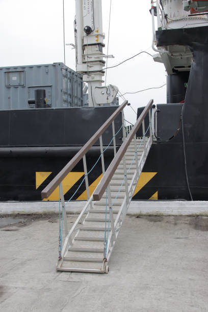 View of the window and blue stairs on the deck of the ferry boat