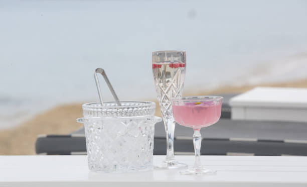 istock Cocktail glasses and ice bucket on the table 1209412084