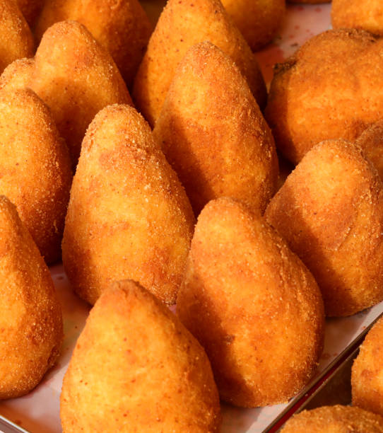 istock fried stuffed balls of rice called ARANCINO in Italian Language 1209415768