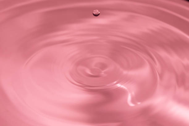 istock water drop bouncing on the surface of more water 1209417887