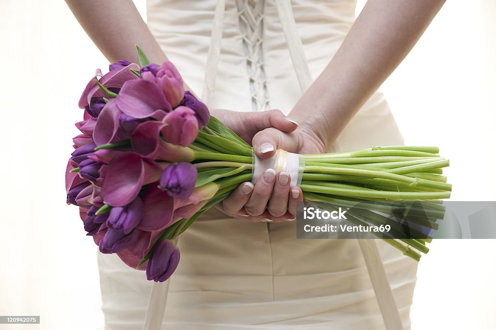 wedding bouquet bride holding a wedding bouquet behind her body Adult Stock Photo