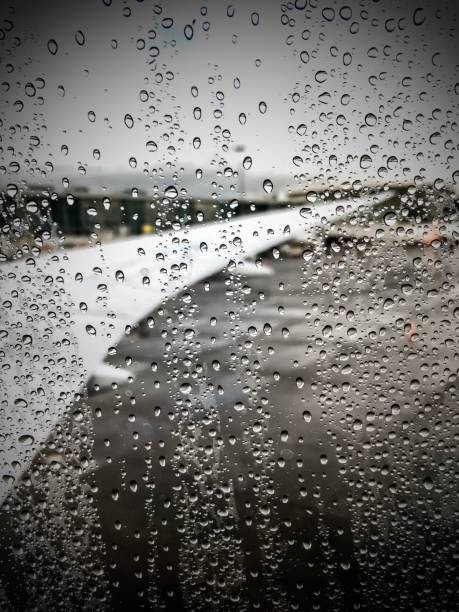 istock Rainy view from window at the airport drops 1209427431