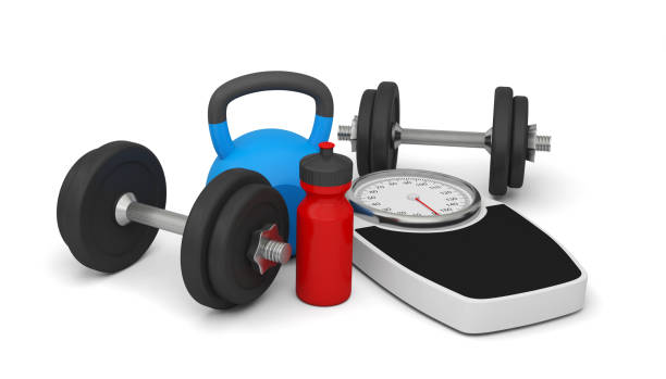 istock diet sport health kettlebell dumbbell bathroom scale 1209428319