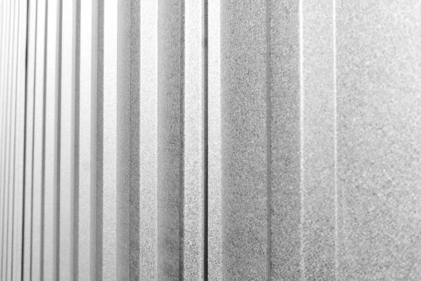 istock Corrugated metal, zinc texture surface, galvanize steel in the vertical line texture in black and white toning 1209431301
