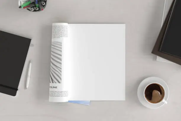 Photo of Blank magazine page. Workspace with magazine mock up