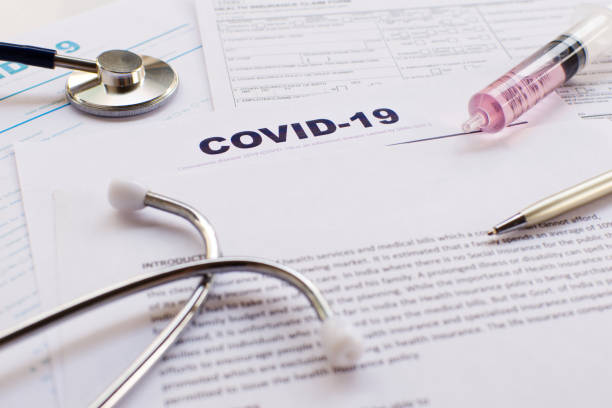 COVID-19 Health insurance concept. Syringe, pen and Stethoscope with copy space on application form Focus on " COVID-19 " COVID-19 Health insurance concept. Syringe, pen and Stethoscope with copy space on application form Focus on " COVID-19 " south korea photos stock pictures, royalty-free photos & images