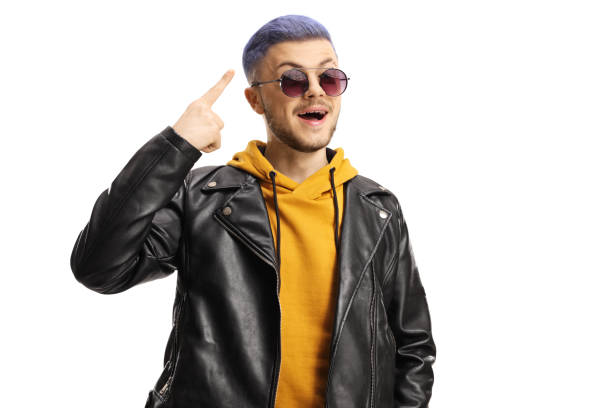 istock Cool young guy pointing at his blue dyed hair 1209448524