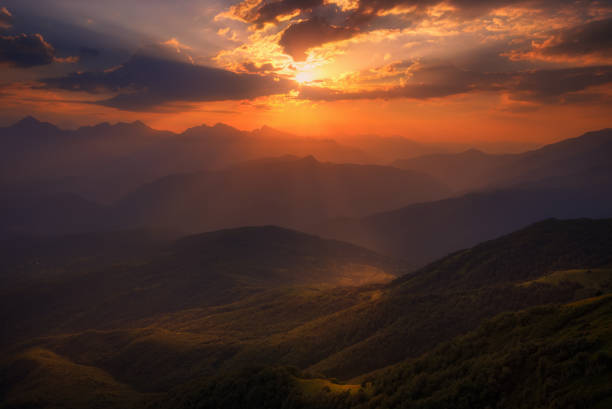 istock Rays of light pass through the clouds, beautiful mountain landscape, georgia, Caucasus 1209448627