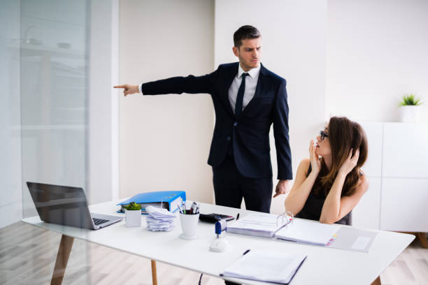 istock Boss Firing Female Employee 1209450052