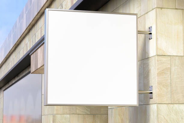 istock Square signboard or signage on the red brick wall with blank white sign mock up. Side view. 1209451017