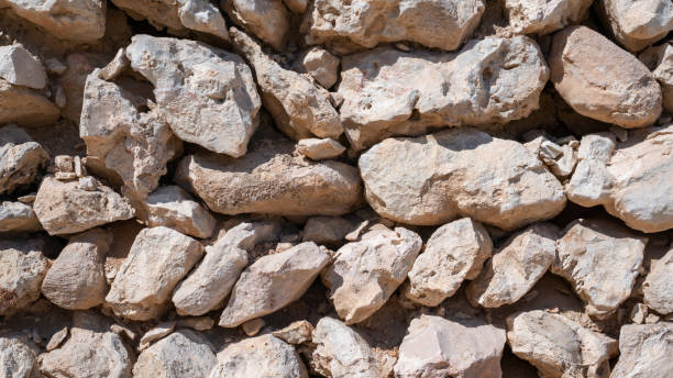 istock Background image of traditional arab stone wall in Qatar. 1209451096