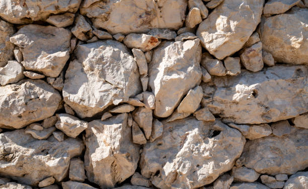 istock Background image of traditional arab stone wall in Qatar. 1209451166