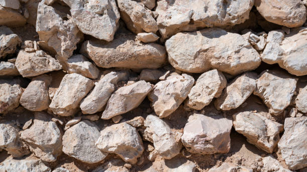 istock Background image of traditional arab stone wall in Qatar. 1209451213