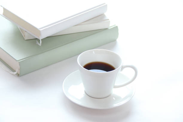 istock Books and Coffee in white cup 1209451667