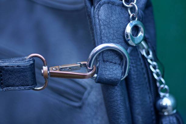 istock gray metal carabiner with ring and black harness 1209455847