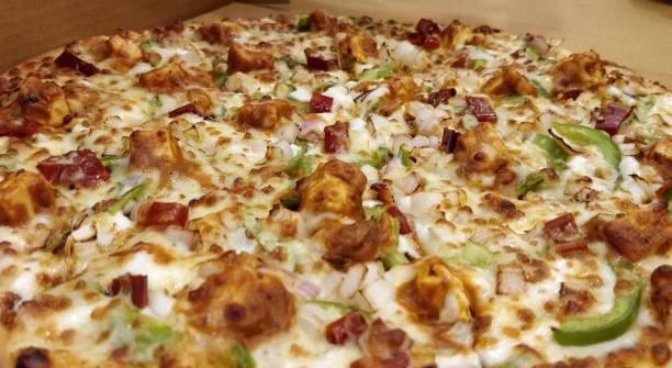 istock Paneer Tikka Butter Masala Pizza 1209458973