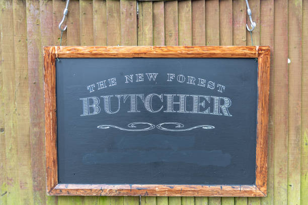istock Butcher wrote on a chalkboard and hang on wooden wall 1209460096