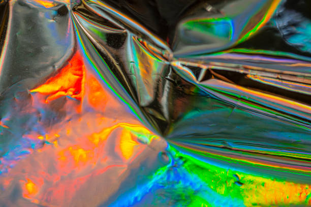 istock Aluminum foil with reflecting colors 1209460652
