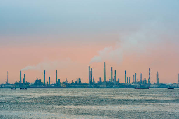 Oil refinery at sunset on Bukom Island in Singapore