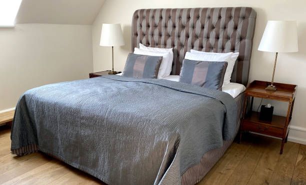 istock Double bed in luxury bedroom 1209463109
