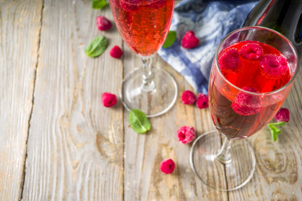 istock Kir Royale Cocktail with Raspberries 1209468461