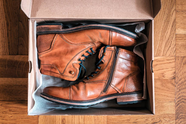 istock brown leather shoes in the box 1209468506