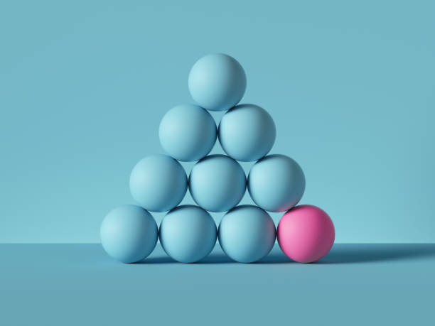 istock 3d render, pyramid of balls isolated on blue background. Billiards game. Primitive geometric shapes. One of a kind metaphor. Modern minimal design 1209468742