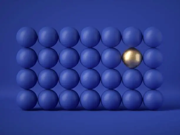 3d render, abstract wall of many balls isolated on blue background. Gold element. Balance, gravity, one of a kind, exception concept. Matrix of geometric primitive shapes. Modern design. Clean style