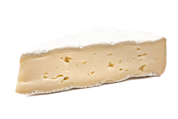 istock triangle of cheese brie on white 1209469526