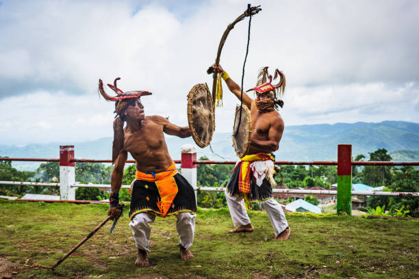 indonesia caci dance war whip fighter action east nusa tenggara - flores man foto e immagini stock