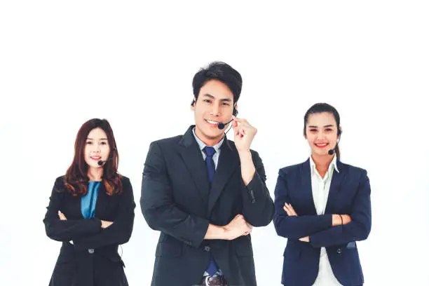Young asian call center team, Smiling business man and woman with headset on white background at day