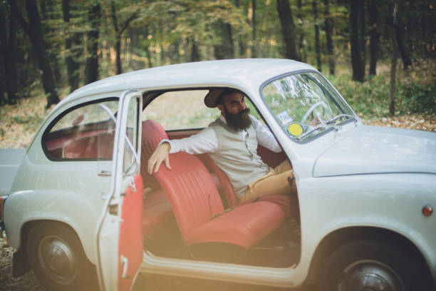 istock Hipster men traveling in his old timer 1209474687