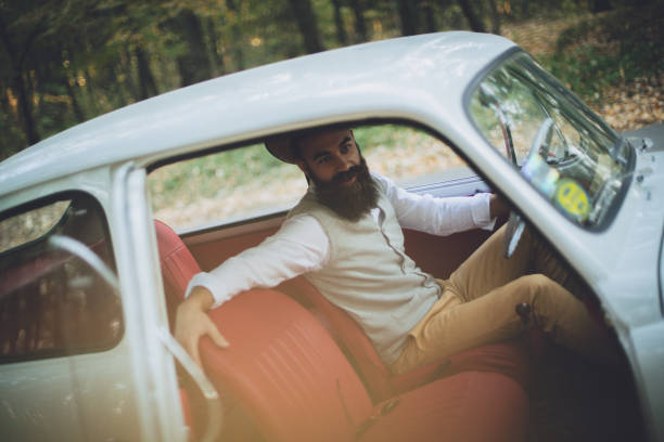 istock Hipster men traveling in his old timer 1209474691
