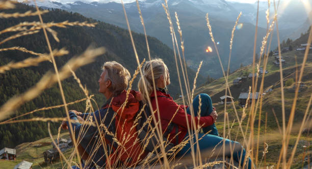istock Hiking couple relax in alpine environment 1209479214