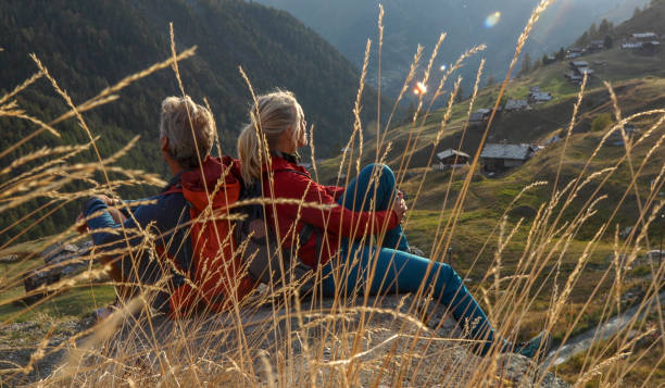 istock Hiking couple relax in alpine environment 1209479236
