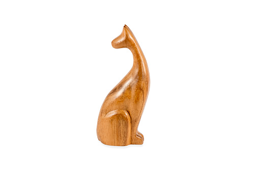 wooden cat figurine on white