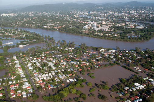 Aerial view of the disastrous Brisbane Flood of 2011 in which 28,000 homes were inundated.  This view shows the suburb of Fairfield, the swollen Brisbane River and The University of Queensland.