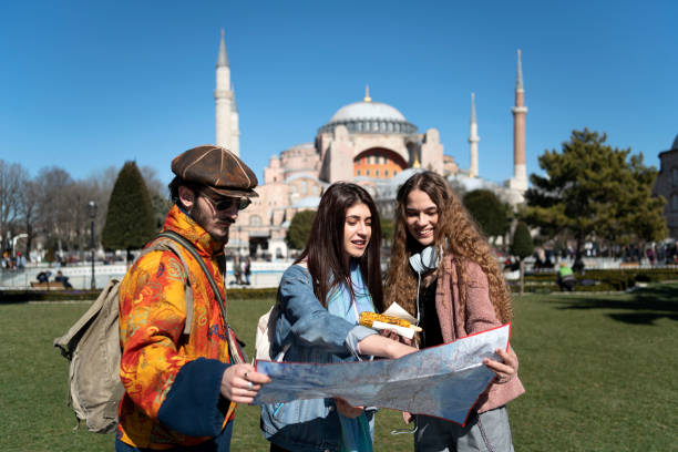 istock Young people looking at the map in front of Hagia Sofia Istanbul 1209486121
