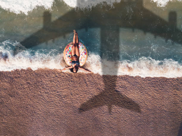 istock Tourist sunbathing at the beach 1209488154