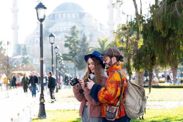 istock Tourists taking photos in front of blue mosque 1209490721