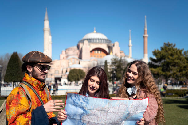 istock Young people looking at the map in front of Hagia Sofia Istanbul 1209493135