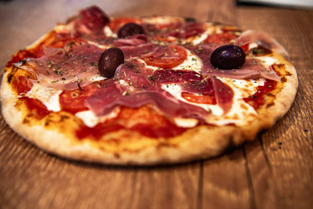 istock Buffalo mozzarella pizza with Parma ham 1209498649