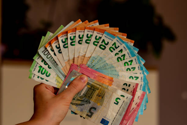 istock European currency - banknotes, notes and coins 1209500466