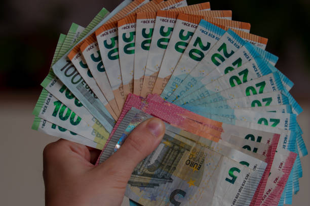 istock European currency - banknotes, notes and coins 1209500971