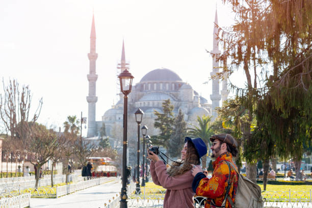 istock Tourists taking photos in front of blue mosque 1209501505