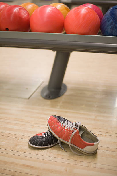 istock Bowling balls and shoes 120950456