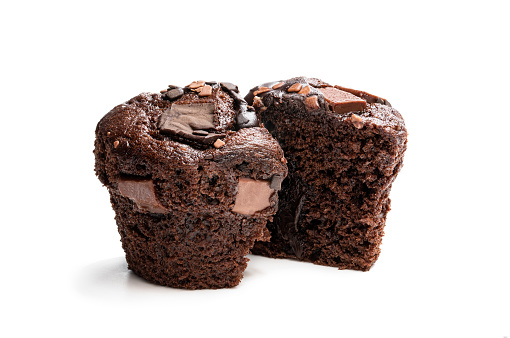 Dark  chocolate muffin isolated on white