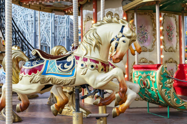 istock Horse in vintage style on a children's circular carousel. 1209509015